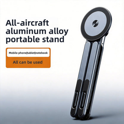 Adjustable foldable device stand holding a laptop