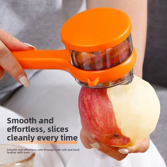 Orange red vegetable peeler with built-in peel collection compartment